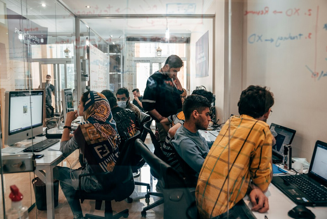 group of programmers collaborating