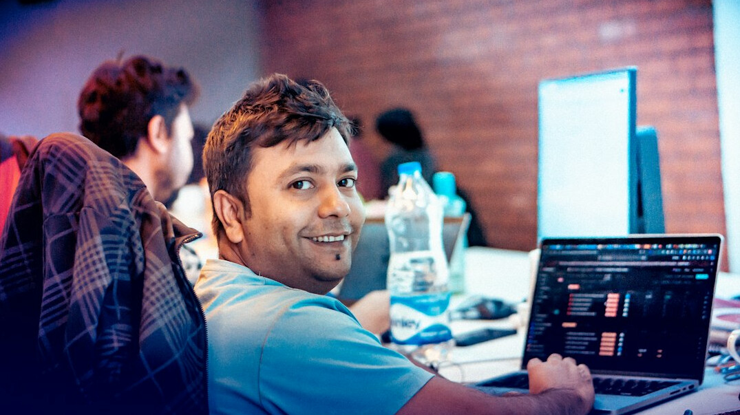successful programmer smiling